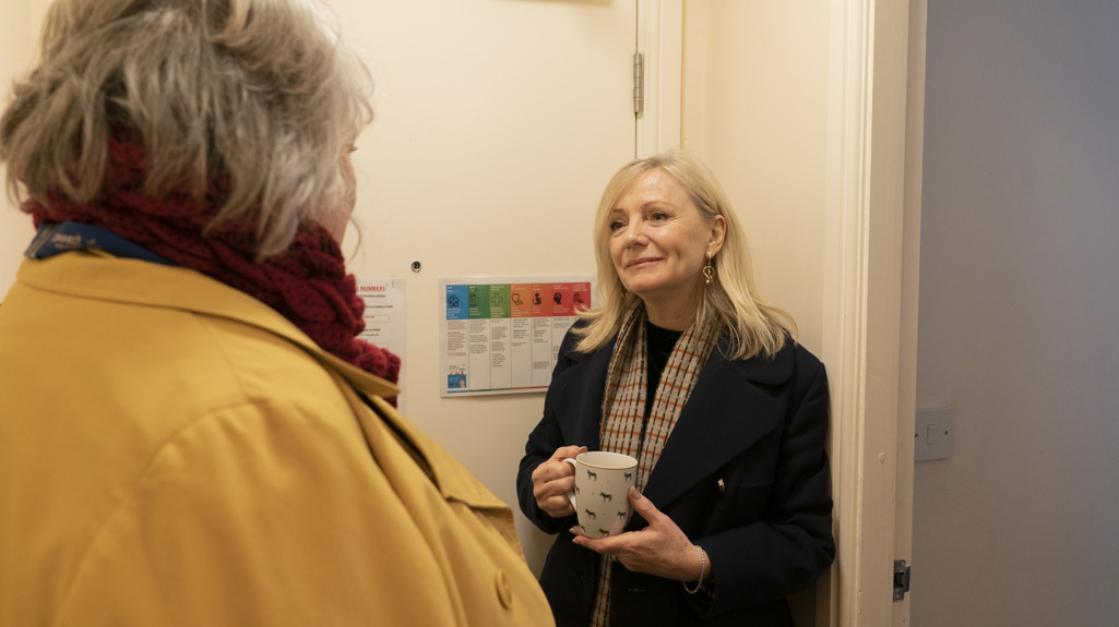 Mayor of West Yorkshire Tracy Brabin chatting to another woman who has her back to the camera