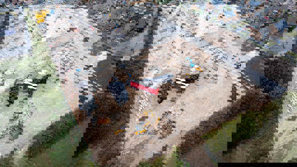 An aerial photo showing construction underway at the zero-gas housing development.