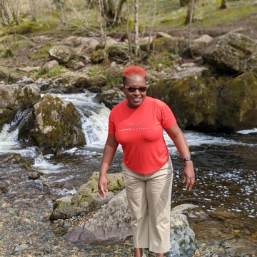 Picture of Loice Chunda by a river 