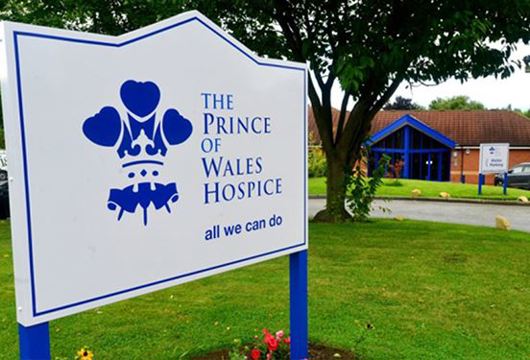 Prince of Wales Hospice signage in front of the hospice building