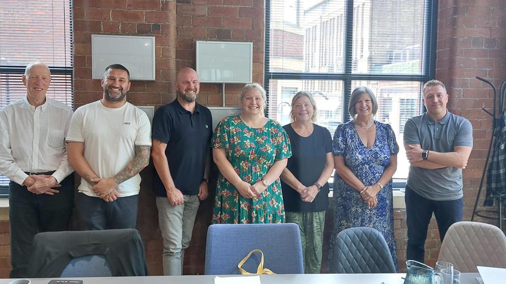 The Review Crew stood together