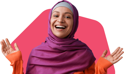 Woman with hijab on and with her hands in the air