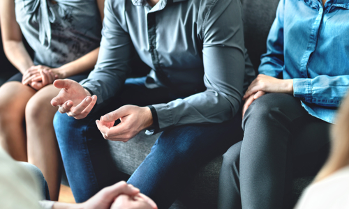 People sat together having a discussion