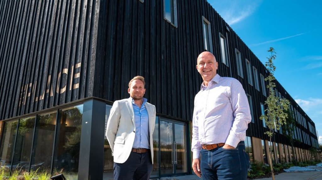 Two men standing outside Yorkshire Housing's new hub