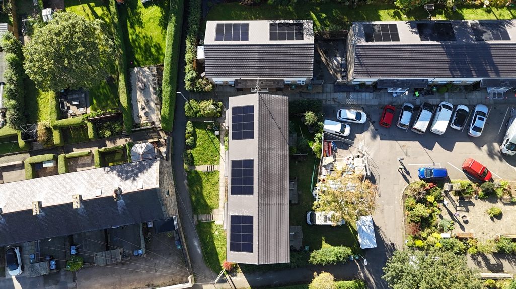 Aerial view of homes at Allen Croft with solar panels installed on multiple roofs