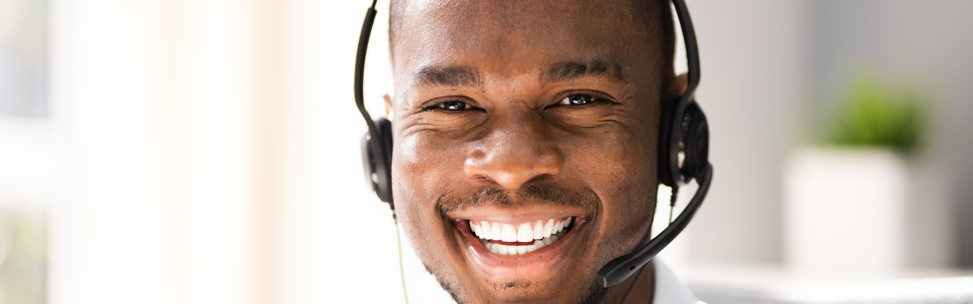 Smiling man wearing headphones