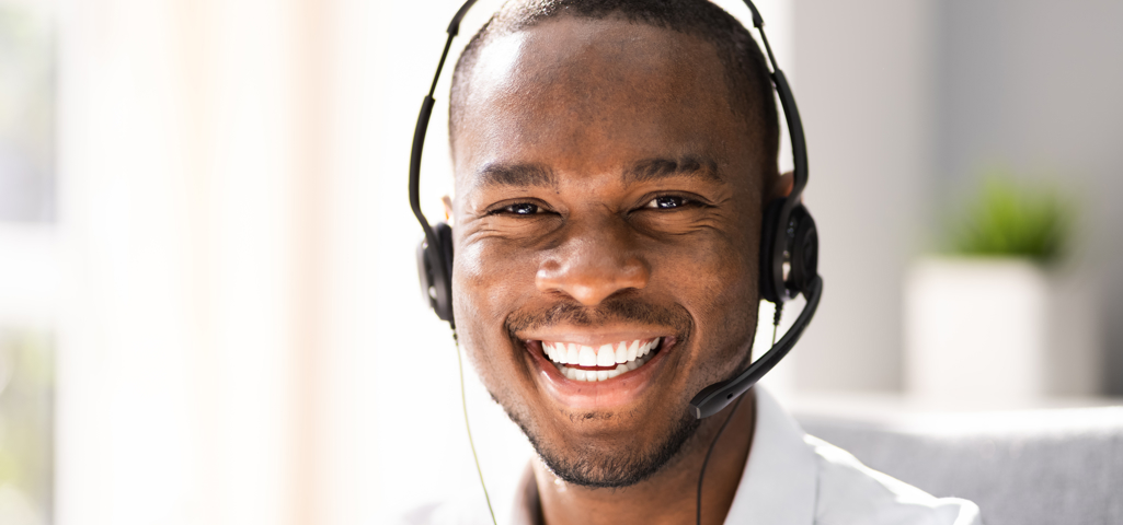 Smiling man wearing headphones