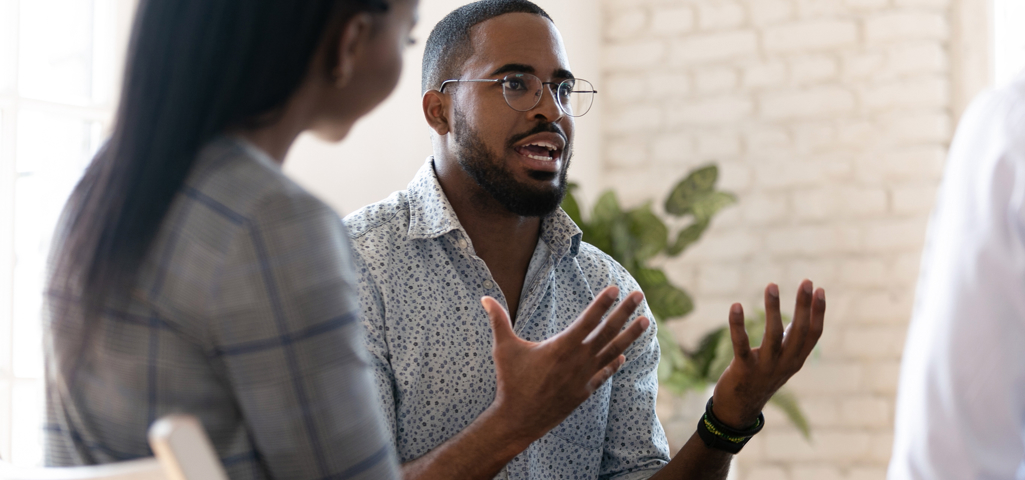 Man explaining something using his hands enthusiastically 