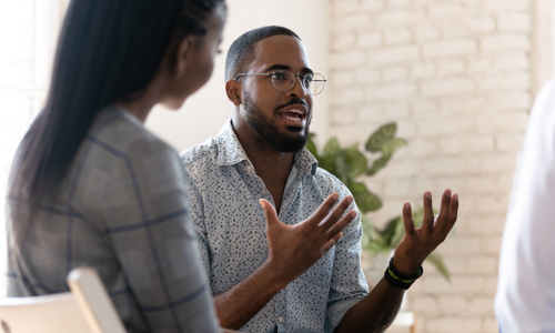 Man explaining something using his hands enthusiastically 