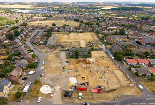 Aerial view of the Colliery Gate development site in Monk Bretton, Barnsley, showing groundworks underway for 72 new affordable homes.