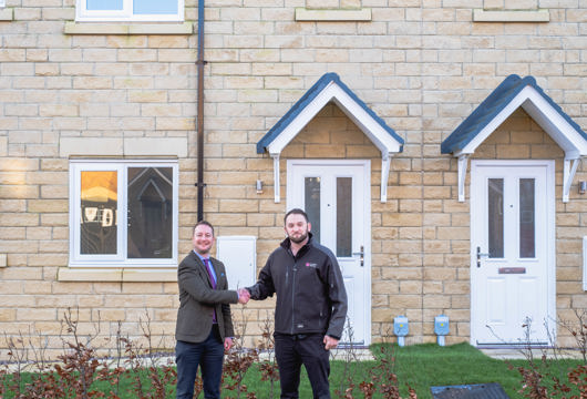 Joel Frank, Land Director at Charles Church Yorkshire, is pictured on the left with Ed Blake, Land Buyer at Yorkshire Housing, at the Harrogate Harlow Hill development.