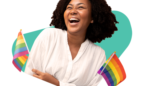 Woman smiling holding pride flags
