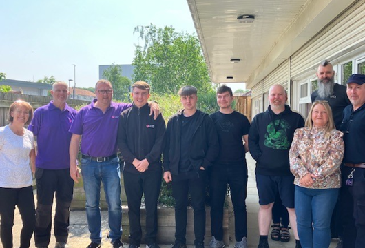 A group picture of the team at Swarcliffe stood together outside